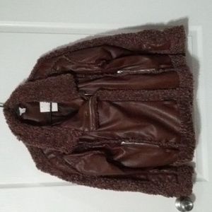 A dark brown moto style jacket.